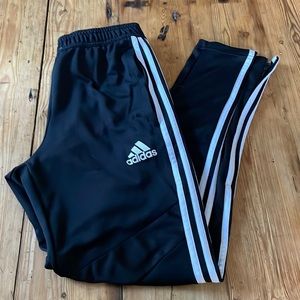 Adidas Mens track pants. Black with white stripes. Size small
